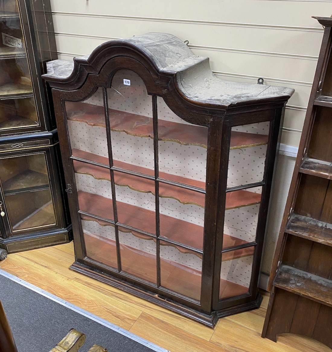 A late 18th / early 19th century Dutch glazed oak wall hanging display cabinet, width 120cm, depth 31cm, height 132cm
